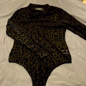 Sheer bodysuit with velour leopard print.